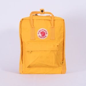 Fjallraven Kanken backpack. Warm yellow.